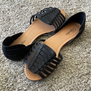 Black horchata sandals. Never worn very soft and not stiff!